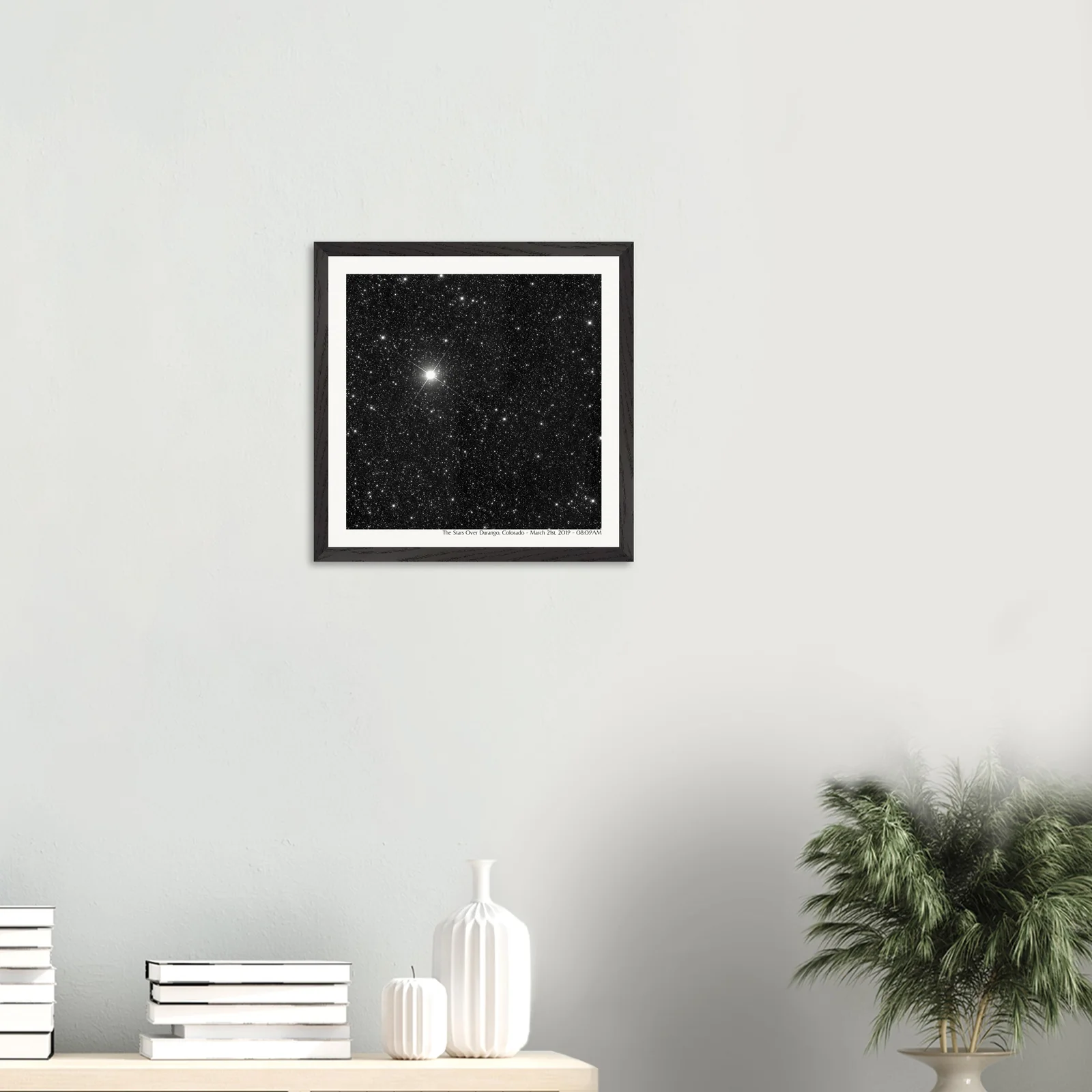 16x16" star map print displayed in a modern living room